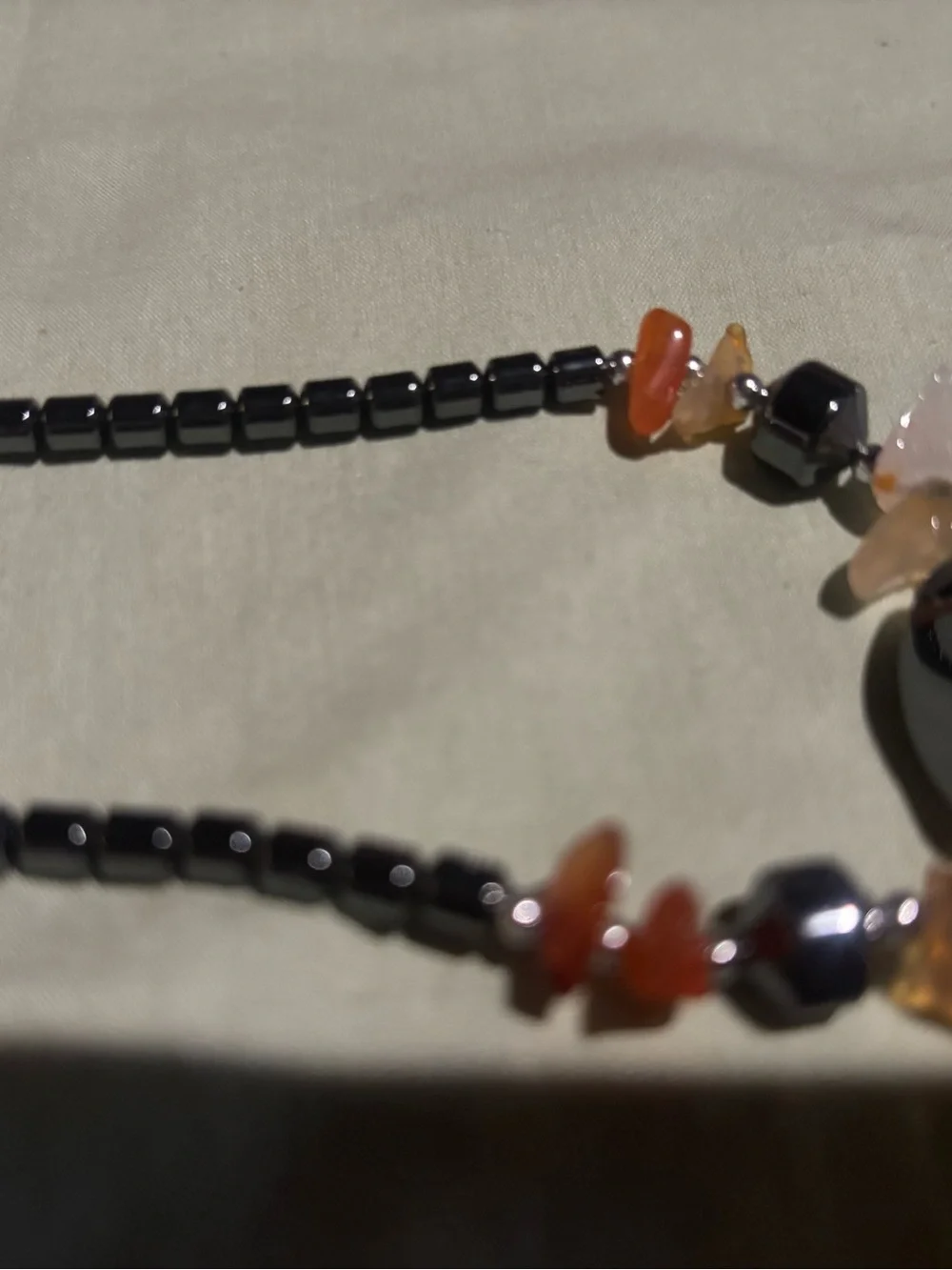 Hematite Bead Necklace with Orange Carnelian Accent